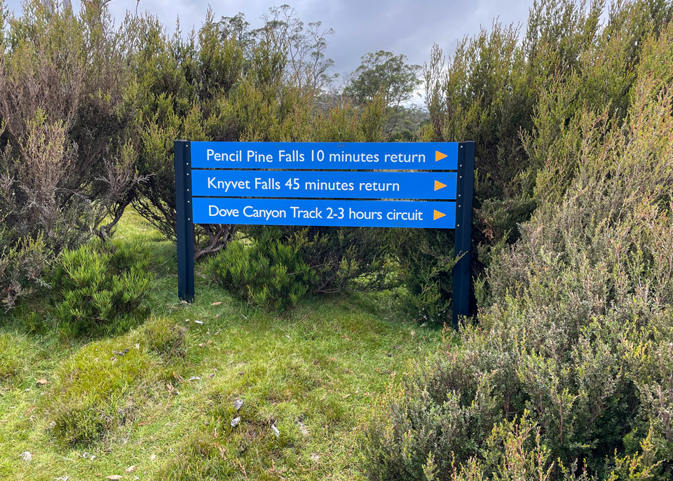 The walking track sign for Knyvet Falls and Pencil Pines Falls at Cradle Mountain